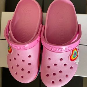 Crocs pink rainbow heart slip. Size J 3